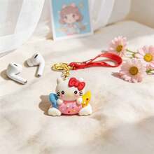 名创优品 (MINISO) 三丽鸥可爱甜点主题钥匙扣，柔软硅胶腕带挂件，包包挂饰，日常携带，背包装饰，车钥匙扣，便携式美观配饰，Y2K 复古风手机挂绳挂件 - 款式3 - 查看 2