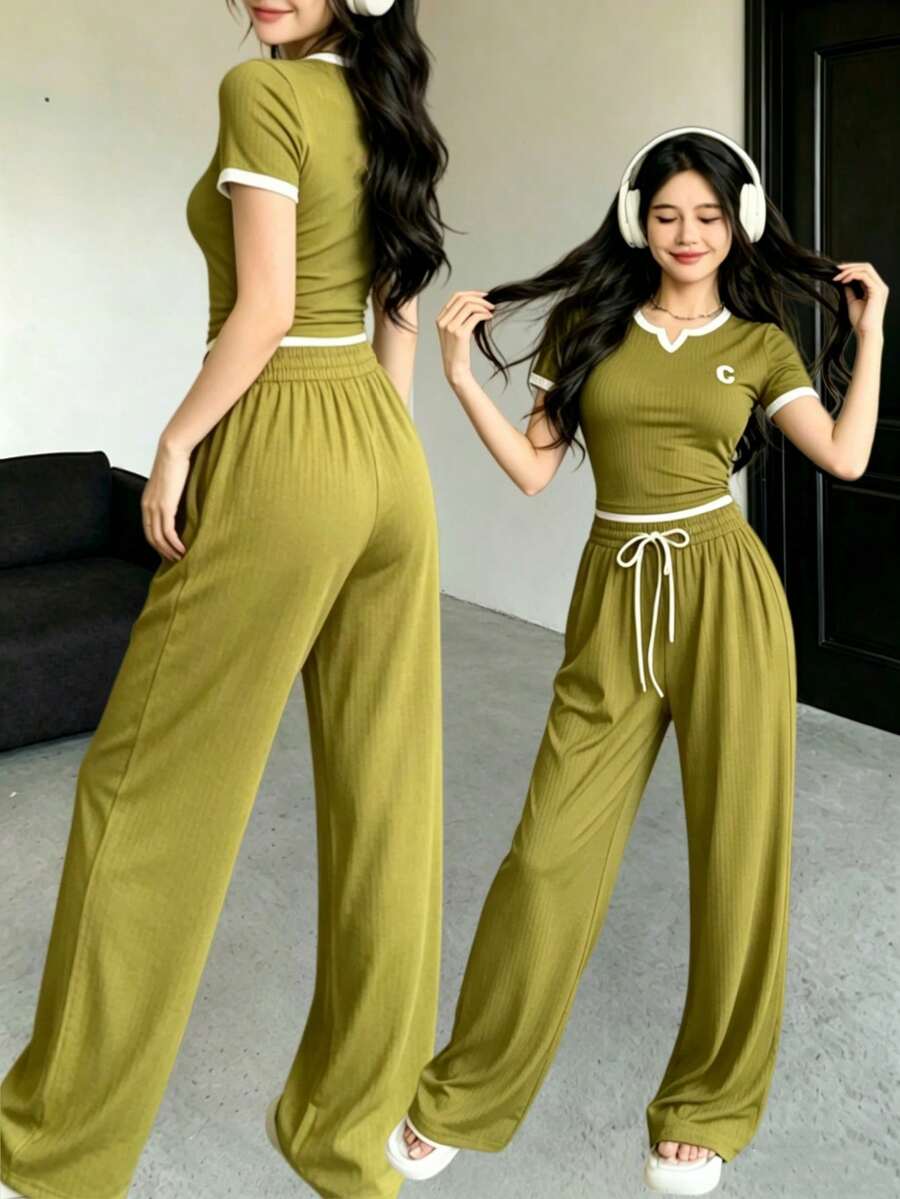 The Best Gift For Mother's Day: Women's 2-Piece Activewear Set With A Round Neck, Short-Sleeved Top, And Long Pants. A Minimalist, Solid-Color Short-Sleeved Top And Pants Set. Casual Outfit. - 軍綠色 - 查看 1