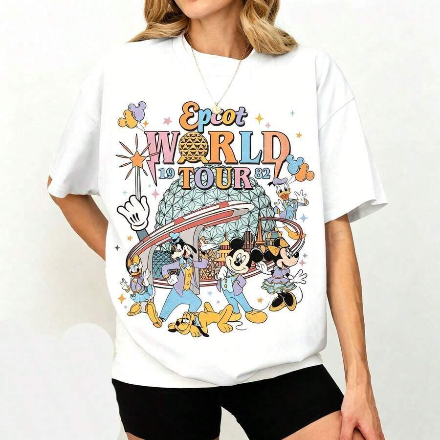 Disney Women's T-Shirt  1PC Licensed "Retro Epcot World Tour 1982 Mickey & Friends" Cartoon Printed Oversized T‑Shirt, Short Sleeve Tee For Disney Travel, Vacations & Theme Parks. 2026 New Style, Ideal For Family Outings & Drinking‑Around‑The‑World Matching Outfits, Unisex For All Ages. High‑Quality Cotton Fabric, Soft & Breathable. Vintage Pastel Epcot Spaceship Earth & Classic Character Group Print Design, The Best Gift For Disney Epcot Vacation Lovers. - White - View 1