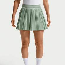 Nike Minifalda deportiva plisada de unicolor y versátil para mujer - Verde - Ver 1