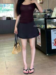 This Pink A-Line Mini Skirt (For Women) Is A Simple Satin Short Skirt With A Ribbon At The Hem, Offering A Casual Style. It Has Just The Right Amount Of Stretch, Making It Perfect For A Cute Summer Outfit. - Black - View 1