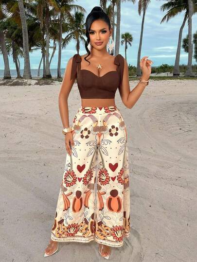 Elegante tweedelige set voor dames: crop top met spaghettibandjes, strikdetail en lange rok met bloemenprint, niet-elastische stof.