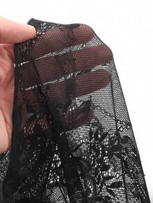Blusa larga de mujer con mangas abullonadas, cuello halter con lazo delantero, bajo con volantes, estampado floral botánico sobre base oscura, textura de tela, elegante para Año Nuevo, Navidad, fiesta de boda - Negro - Ver 2