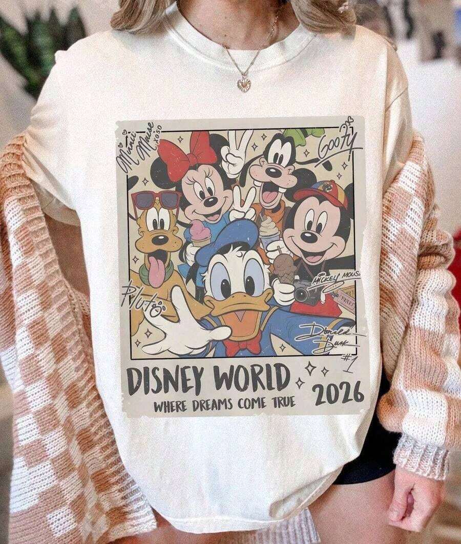 Disney Women's T-Shirt 1PC Licensed "Vintage Disney World 2026 Mickey Minnie Goofy Pluto Donald Duck Group Portrait" Cartoon Printed Oversized T‑Shirt, Short Sleeve Tee For Disney Travel, Vacations & Theme Parks. 2026 New Style, Ideal For Family Outings & Matching Outfits, Unisex For All Ages. High‑Quality Cotton Fabric, Soft & Breathable. Retro Distressed Frame Design With Signature‑Style Character Autographs, Perfect For Disney World 2026 Vacation Matching Outfits. - White - View 1