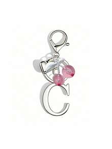 一款粉色樱桃吊坠钥匙扣，饰有A-Z字母、心形图案和粉色樱桃吊坠。配有圆形挂环，适合挂在女士包包、钱包或车钥匙上，是生日、圣诞节或周年纪念日的完美礼物（字母钥匙扣）。 - 彩色 - 查看 17