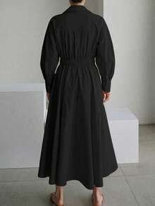 Vestido Camisero Minimalista con Cintura Ceñida, con Diseño de Cuello y Pechera Simple, Mangas 3/4 y Falda Midi en Forma de A. Elegante y Chic sin Esfuerzo para el Trabajo, Negocios Ligeros y Uso Diario. Negro Elegante - Negro - Ver 7