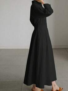Vestido Camisero Minimalista con Cintura Ceñida, con Diseño de Cuello y Pechera Simple, Mangas 3/4 y Falda Midi en Forma de A. Elegante y Chic sin Esfuerzo para el Trabajo, Negocios Ligeros y Uso Diario. Negro Elegante - Negro - Ver 6