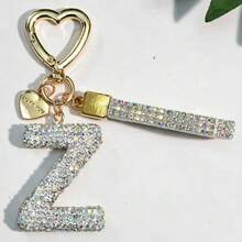1 Móc khóa chữ cái A-Z đính đá sang trọng, hợp kim mạ vàng với mặt dây chuyền chữ cái lấp lánh và dây đeo cổ tay đính đá, thích hợp sử dụng hàng ngày và dự tiệc. - trắng - Xem 26