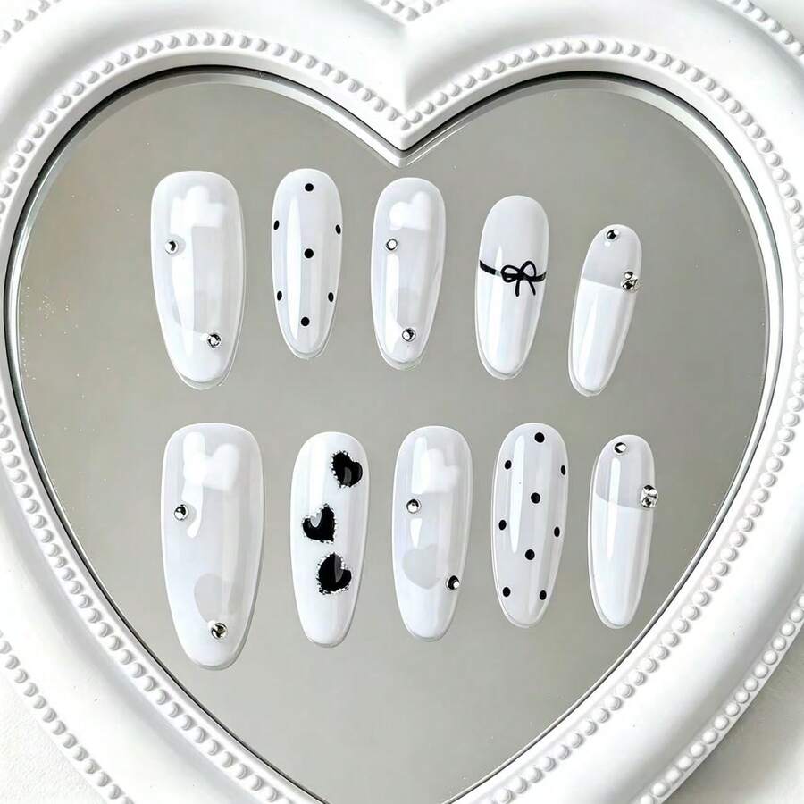 Bộ 10 miếng, nền trắng tinh khiết với họa tiết trái tim vẽ tay, chấm bi, nơ 3D và điểm nhấn đá lấp lánh, decal dán móng có thể tháo rời, kiểu dáng tối giản thanh lịch, phủ kín toàn bộ móng. - màu đen - Xem 1