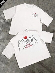 Manos que forman un gesto de promesa con un corazón rojo que simboliza cariño y un mensaje de buenos días que transmite energía positiva y conexión entre personas mostrando optimismo y ternura ideal para uso diario camiseta de hombre de doble cara con estampado moderno y cómodo - Blanco - Ver 8