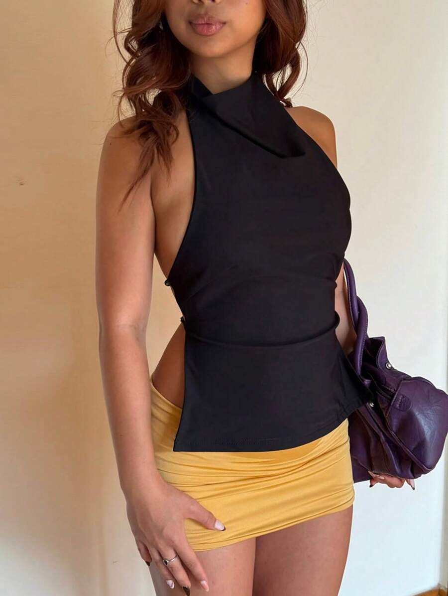 Áo crop top nữ Top Dazzle không tay, cổ yếm, hở lưng, chất liệu vải dệt kim, phong cách ôm sát tôn dáng bodycon - màu đen - Xem 1