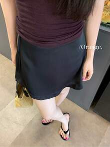 This Pink A-Line Mini Skirt (For Women) Is A Simple Satin Short Skirt With A Ribbon At The Hem, Offering A Casual Style. It Has Just The Right Amount Of Stretch, Making It Perfect For A Cute Summer Outfit. - Black - View 4
