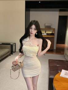 An Elegant And Sophisticated Halter-Neck Women's Dress With An Open Back. Perfect For Summer. The Slim Silhouette Offers Excellent Figure-Flattering Effects. An Ideal Dress For Summer. - Apricot - View 1