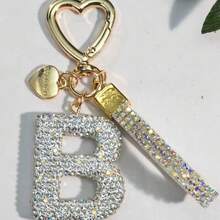 Móc khóa chữ cái A-Z đính đá lấp lánh, khóa hình trái tim vàng với mặt dây chuyền "LOVE YOU" và dây đeo đính đá lấp lánh, phụ kiện trang trí túi xách thanh lịch, món quà tốt nghiệp và sinh nhật hoàn hảo. - trắng - Xem 37
