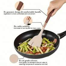 Bộ dụng cụ nấu ăn 11 món kèm giá đỡ - Bộ dụng cụ nhà bếp, tay cầm bằng gỗ có họa tiết, thìa xới thức ăn chống dính kèm hộp đựng. - Nhiều màu - Xem 9