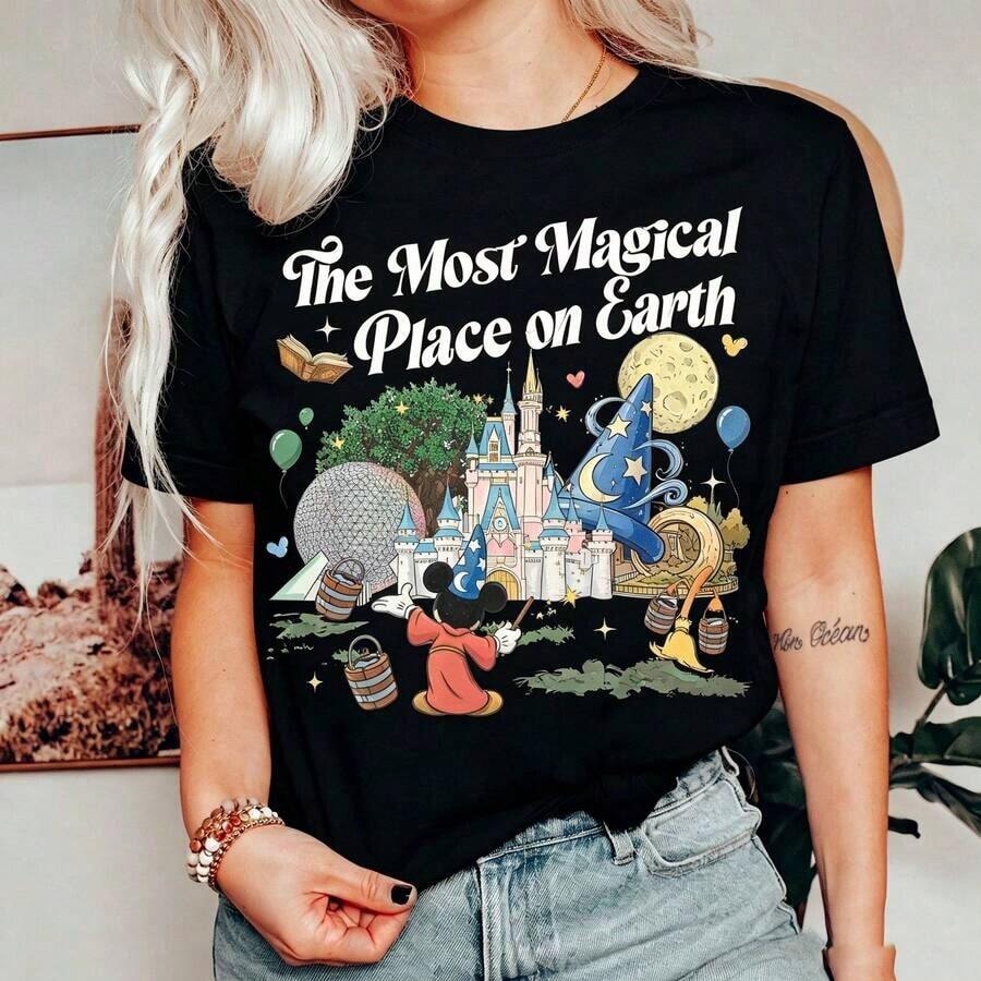 Disney Women's T-Shirt  1PC Licensed "Vintage The Most Magical Place On Earth Sorcerer Mickey Disney Park Landmarks" Cartoon Printed Oversized T‑Shirt, Short Sleeve Tee For Disney Travel, Vacations & Theme Parks. 2026 New Style, Ideal For Family Outings & Matching Outfits, Unisex For All Ages. High‑Quality Cotton Fabric, Soft & Breathable. Retro Boho‑Style Park Castle, Spaceship Earth & Fantasia Wizard Mickey Print Design, The Best Gift For Disney Park Fans & Family Vacation Lovers. - Black - View 1