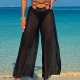 Pantalones negros (con cinturón fino)