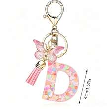 Llavero con letra, borla y colgante de mariposa, para billetera, mochila, bolso de mano - Multicolor - Ver 11