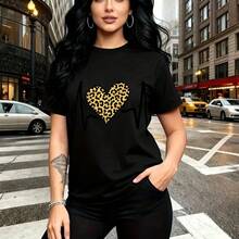 Camiseta de mujer con estampado de corazón en patrón de leopardo amarillo y negro con línea EKG blanca - camiseta casual de manga corta, ajuste cómodo y moderno, estilo urbano y atrevido - ideal para paseos por la ciudad, salidas casuales y regalo pe - Negro - Ver 10