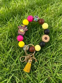1 Peça Chaveiro Pulseira com Contas de Vaca das Terras Altas, Pulseira com Contas de Silicone e Pingente de Margarida, Borla de Camurça e Fecho de Caranguejo Banhado a Ouro, Chaveiro de Pulso Estilo Boêmio Ocidental, Acessório Fofo para Mulheres, Presente Perfeito para Amantes de Vacas, Chaveiro de Carro - 2814 - Visão 1