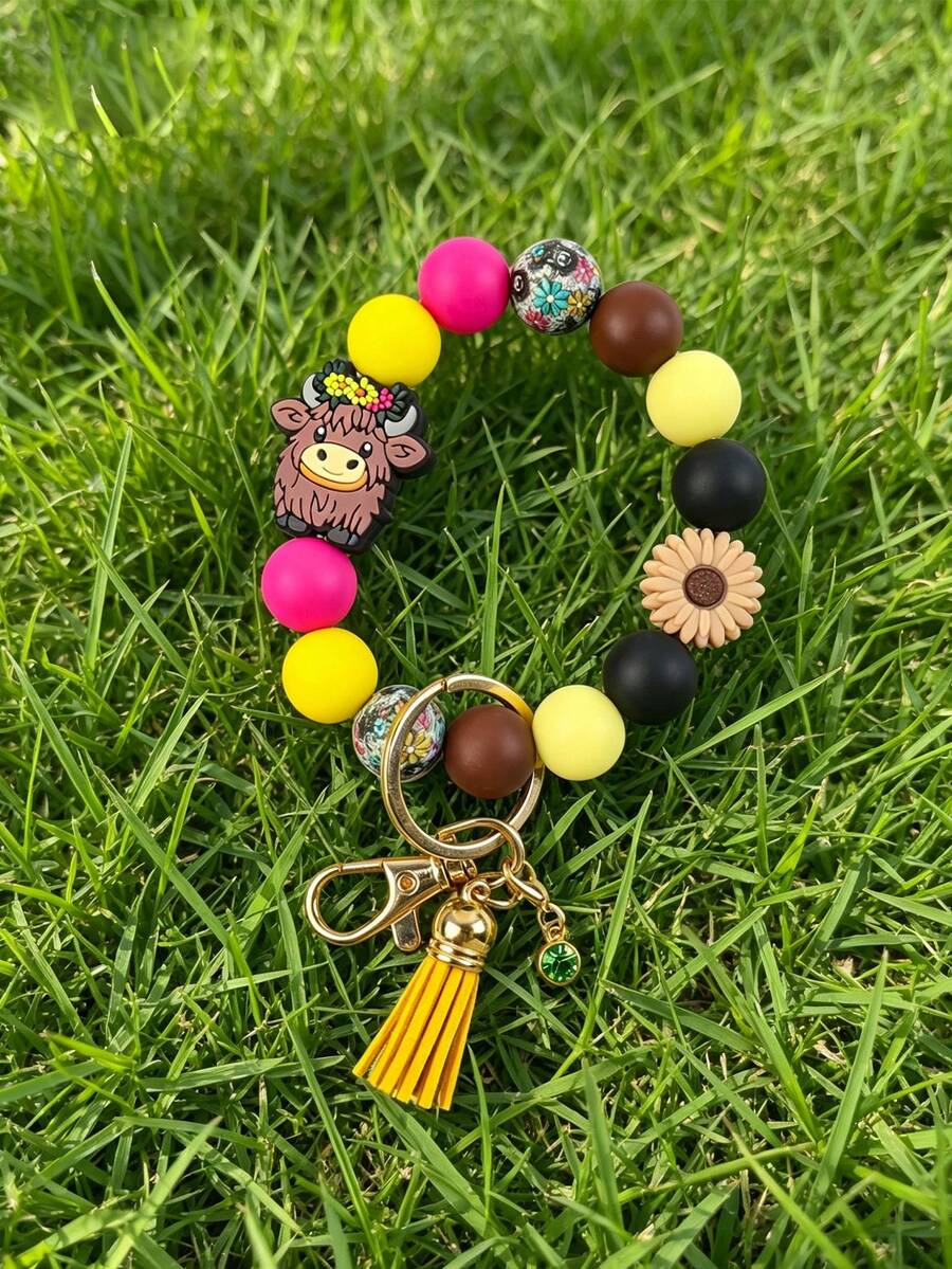 1 Peça Chaveiro Pulseira com Contas de Vaca das Terras Altas, Pulseira com Contas de Silicone e Pingente de Margarida, Borla de Camurça e Fecho de Caranguejo Banhado a Ouro, Chaveiro de Pulso Estilo Boêmio Ocidental, Acessório Fofo para Mulheres, Presente Perfeito para Amantes de Vacas, Chaveiro de Carro - 2814 - Visão 1