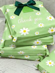 20 pièces Grands sacs d'emballage imprimés de marguerites vertes, sacs cadeaux de rentrée scolaire avec texte "Merci", enveloppes d'expédition en polyéthylène imperméables et auto-scellantes, sacs d'expédition résistants à la déchirure, convenant aux textiles, sacs d'emballage durables, idéaux pour les petites entreprises, les cadeaux de mariage, les faveurs de fête, les cadeaux de la fête des mères, les cadeaux de remise des diplômes, les cadeaux d'anniversaire et les cadeaux de fête de rentrée scolaire - Imprimé marguerite - Voir 1