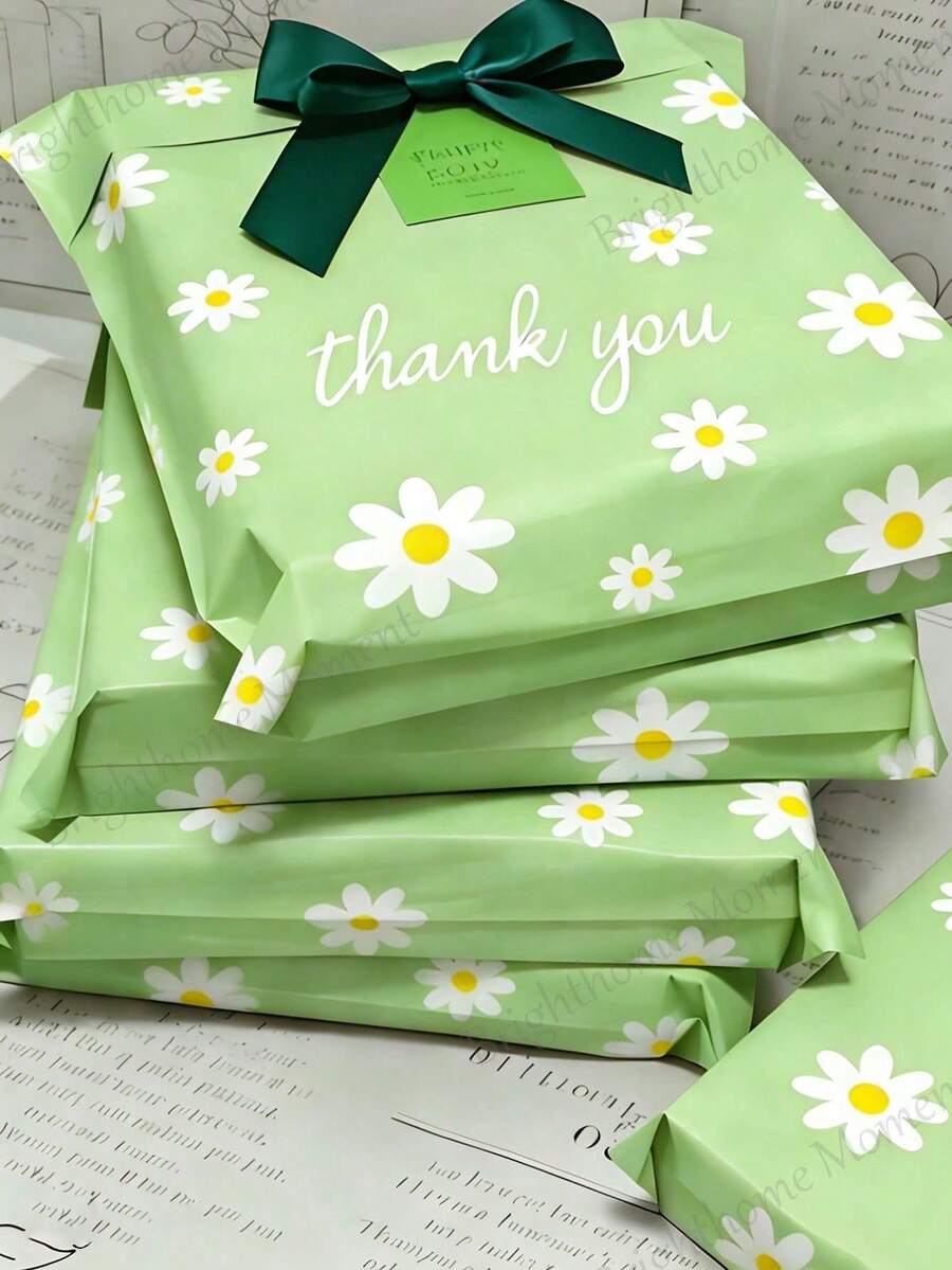 20 pièces Grands sacs d'emballage imprimés de marguerites vertes, sacs cadeaux de rentrée scolaire avec texte "Merci", enveloppes d'expédition en polyéthylène imperméables et auto-scellantes, sacs d'expédition résistants à la déchirure, convenant aux textiles, sacs d'emballage durables, idéaux pour les petites entreprises, les cadeaux de mariage, les faveurs de fête, les cadeaux de la fête des mères, les cadeaux de remise des diplômes, les cadeaux d'anniversaire et les cadeaux de fête de rentrée scolaire - Imprimé marguerite - Voir 1