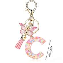 Llavero con letra, borla y colgante de mariposa, para billetera, mochila, bolso de mano - Multicolor - Ver 35