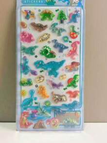 Bộ sticker xốp 3D hình thế giới khủng long đầy màu sắc, rất cần thiết cho nhật ký của trẻ em. Những sticker bóng bẩy này có hình các sinh vật thời tiền sử theo phong cách hoạt hình như T-Rex, hoàn hảo để trẻ em trang trí nhật ký của mình. - Nhiều màu - Xem 9