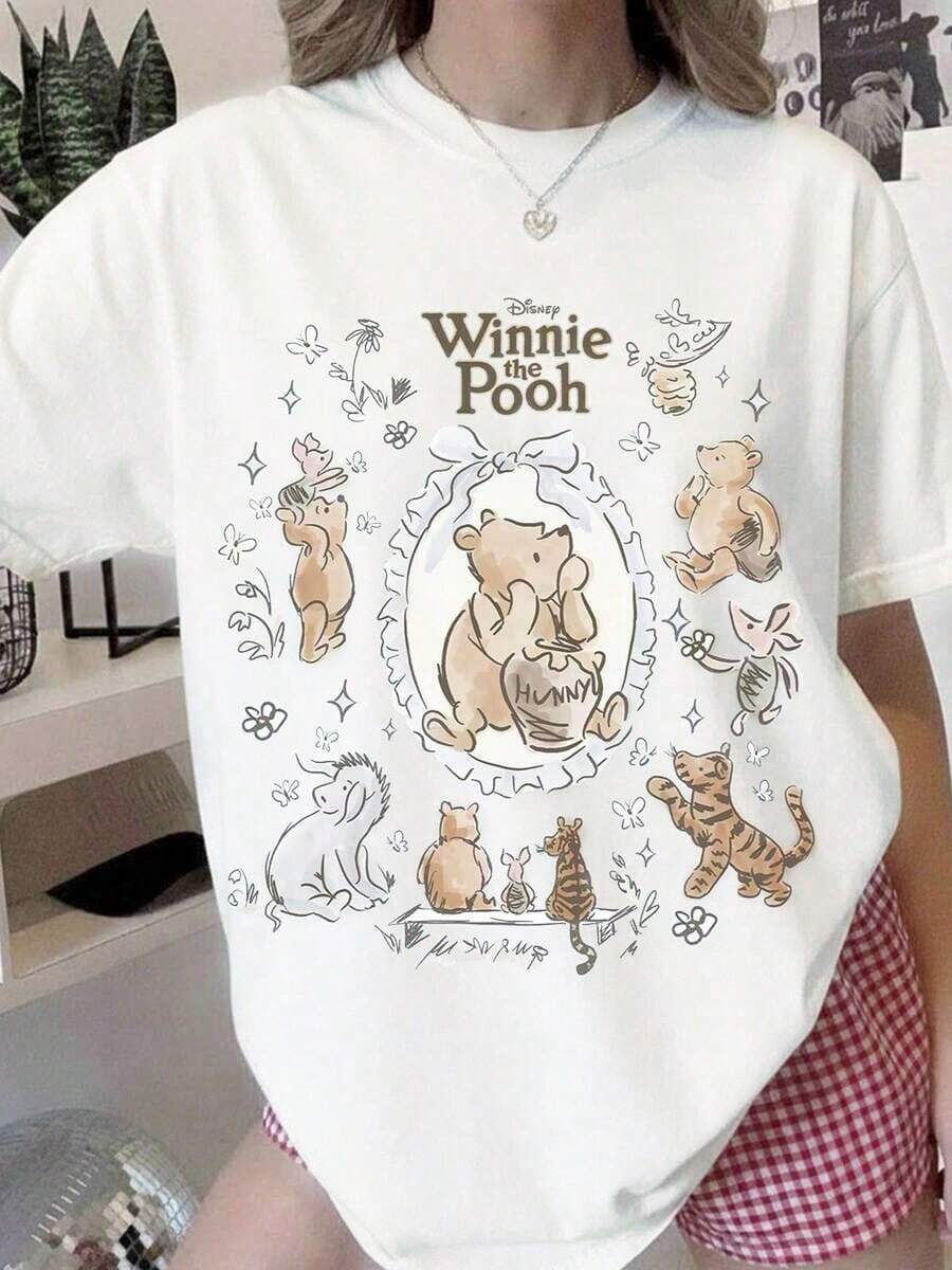 Disney Cartoon Yellow Bear Partner Healing Printed T-Shirt, Suitable For Daily Wear, Easy To Wear In Summer, Micro-Elastic, Soft Round Neck Casual Daily Shirt, Round Neck Summer Sweatshirt, Both Men And Women, Loose Version, Holiday Gifts.--Disneys Disneyland Paris The Magic Kingdom Disneyesque The House Of Mouse Mickey Mouse Empire Modest Summer Outfits Take That T Shirt Summer Coord Tops For Women Summer Summer Clothes Women Summer Clothes Summer Tops Summer Tops Women Summer Co Ord Summer Top Summer Outfits White Top Black Top Holiday Outfits For Women Tops For Women Summer Holiday Gifts Valentine's Day Gifts Earth Day Gifts Oktoberfest Gifts Summer Bank Holiday Gifts - trắng - Xem 1