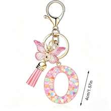 Llavero con letra, borla y colgante de mariposa, para billetera, mochila, bolso de mano - Multicolor - Ver 27