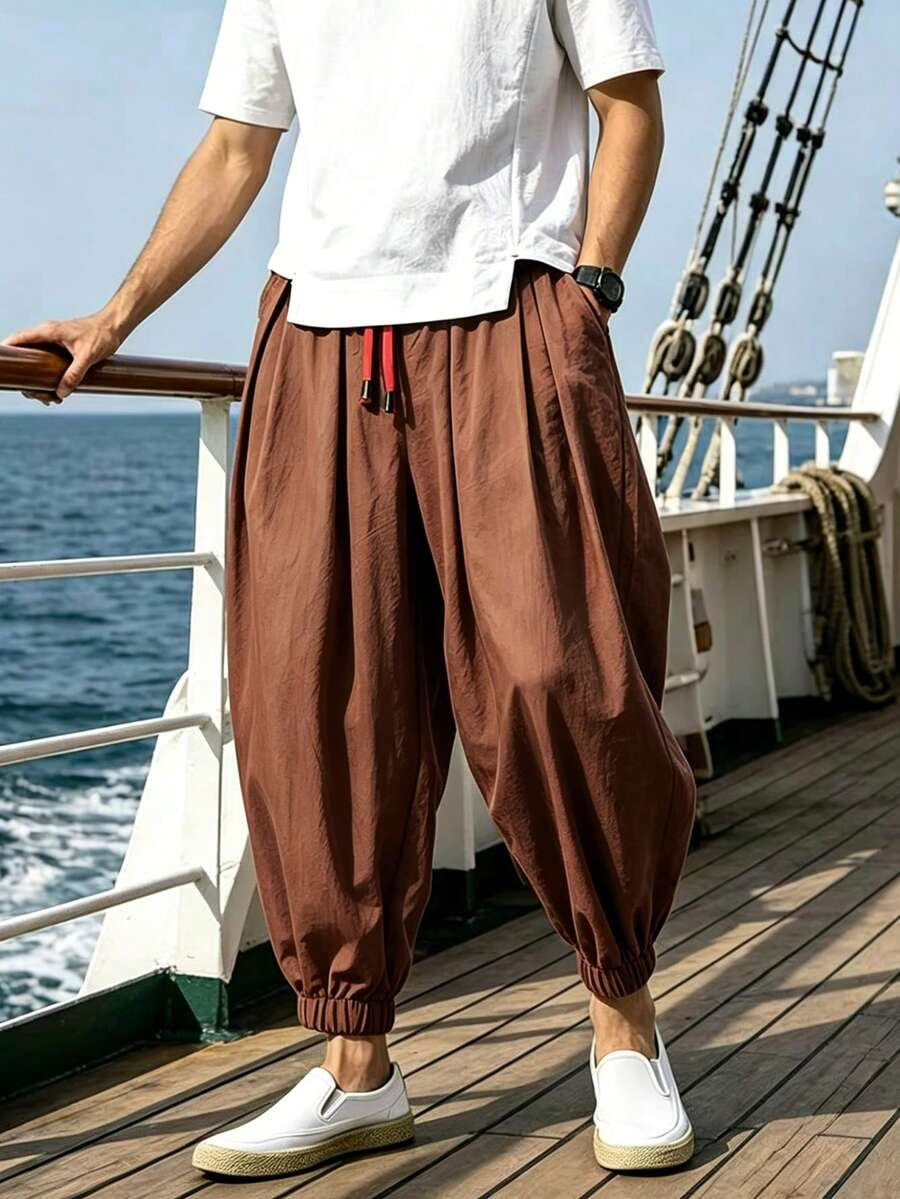 男士宽松亚麻哈伦裤，暖棕色，宽松版型，九分裤长，阔腿设计，适合春秋季穿着