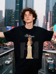 Camiseta Negra para Hombre Ayliva Tour 2025 - Presenta un Estampado de Marca y Año, Corte Regular con Cuello Redondo y Mangas Cortas, Adecuada para Ropa Deportiva Casual, Lavable a Máquina, Duradera y Cómoda para Uso Diario. - Negro - Ver 1