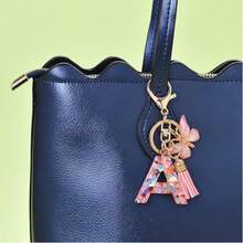 Llavero con letra, borla y colgante de mariposa, para billetera, mochila, bolso de mano - Multicolor - Ver 9