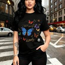 Camiseta de mujer con estampado colorido de mariposas y frase "I am a butterfly" - diseño vibrante con tonos azul, naranja, morado y verde, ajuste cómodo y estilo urbano relajado con bolsillos para las manos - ideal para paseos por la ciudad, salidas - Negro - Ver 1