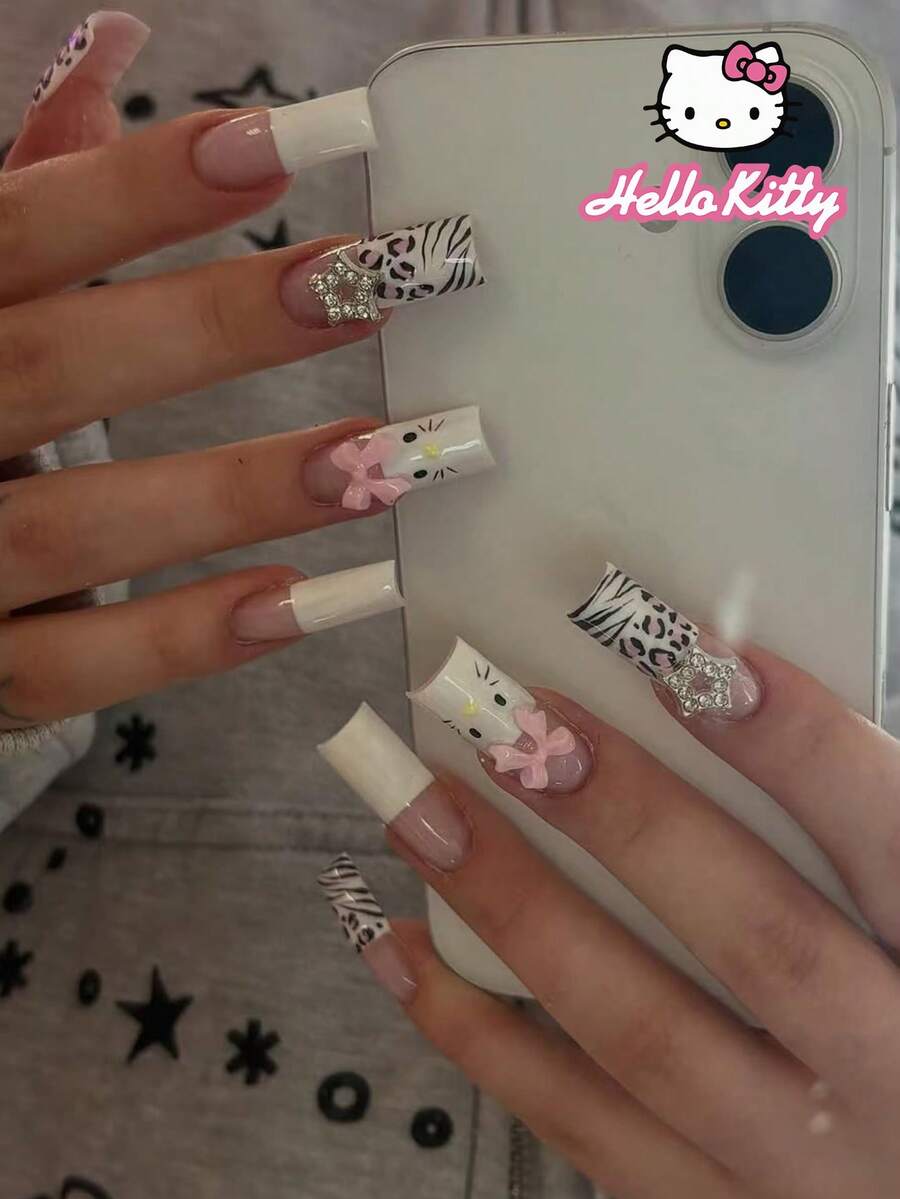 Sanrio Hello Kitty 24片中號正方形豹紋與白色法式穿戴甲,附Hello Kitty、星星、蝴蝶結設計,壓克力假指甲套組,含1片果凍膠與1片指甲锉,適合Sanrio女孩日常、派對與聚會 - 彩色 - 查看 1