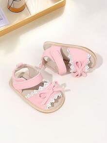 1 Pair Girls Bowknot PU Hook And Loop Design Flat Non-Slip Princess Shoes Soft Rubber Sole Walking Shoes Hollow Breathable Infant Sandals Suitable For Spring And Summer - Pink - View 2
