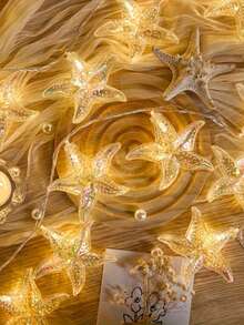 Luces de cadena LED con forma de estrella, adecuadas para decoración de piscina de casa de huéspedes, fiesta en la playa y camino de jardín, crean un ambiente festivo - Guirnalda de luces con forma de estrella de mar de luz cálida - Ver 5