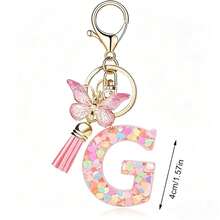 Llavero con letra, borla y colgante de mariposa, para billetera, mochila, bolso de mano - Multicolor - Ver 23