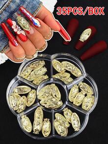 这款35件套金色美甲装饰套装包装在7个隔层的盒子里。套装包含精致的人像图案设计，非常适合在家或美甲沙龙打造美甲造型，是理想的美甲装饰配件。 - 金色 - 查看 9
