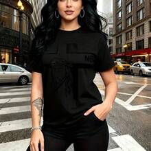 Camiseta de mujer con estampado de cruz estilizada y rostro de Jesús Cristo con letras NBS - camiseta casual de manga corta, ajuste cómodo y moderno, estilo urbano y espiritual con toque religioso - ideal para paseos por la ciudad, salidas casuales y - Negro - Ver 10
