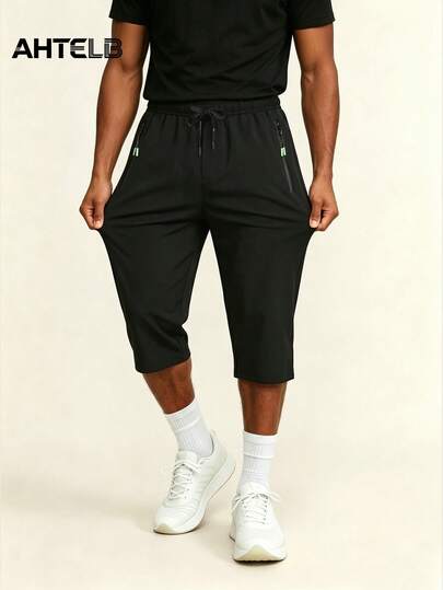  AHTELB Men's Summer Thin Ice Silk 3/4 Pants, Loose Straight Casual Mid-Length Trousers, Elastic Waist Drawstring Design, Stretchy Breathable Quick-Dry Fitness Pants, Anti-Theft Zipper Design, Suitable For Outdoor Leisure, Daily Commute And Gym Workout, Gifts For Friends, Husband, Boyfriend Sports