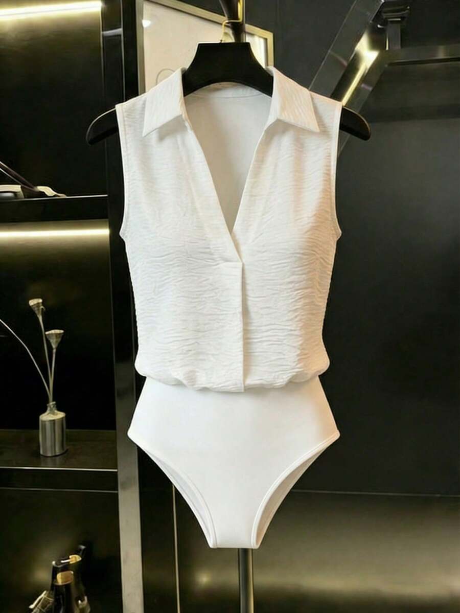 Mono blanco holgado sin mangas con cuello de camisa y escote en V, de tela arrugada, estilo casual, minimalista y de vacaciones, mono de una sola pieza, nueva llegada 2026 - Blanco - Ver 1