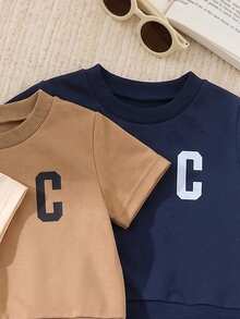 6件套时尚酷炫字母C印花短袖套装，适合春夏幼儿男童穿着，柔软针织面料，带帽设计，圆领，时尚街头风和度假风，适合上学、户外玩耍、派对、休闲穿着。 - 彩色 - 查看 7
