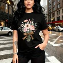 Camiseta de mujer con estampado floral colorido y lazo marrón, diseño de rosas y flores blancas sobre fondo negro - camiseta casual de manga corta con cuello redondo, ajuste cómodo y elegante para el día a día en la ciudad - ideal para paseos urbanos - Negro - Ver 1