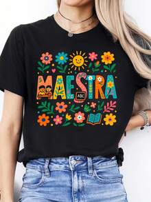 Camiseta informal de manga corta con cuello redondo y estampado floral 'MAESTRA', talla grande de largo regular, a la moda para fiestas. - Negro - Ver 1