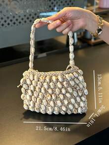 Sac à main crocheté recouvert de coquillages, léger et respirant, design unique et inspiré du style bohème. Facile à assortir avec des robes d'été, des tenues en lin et des tenues de soirée. Parfait pour les brunchs, les événements en plein air et les sorties en vacances. - Blanc - Voir 4