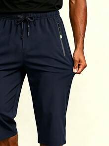 AHTELB Men's Summer Thin Ice Silk 3/4 Pants, Loose Straight Casual Mid-Length Trousers, Elastic Waist Drawstring Design Sports - Navy Blue - View 3