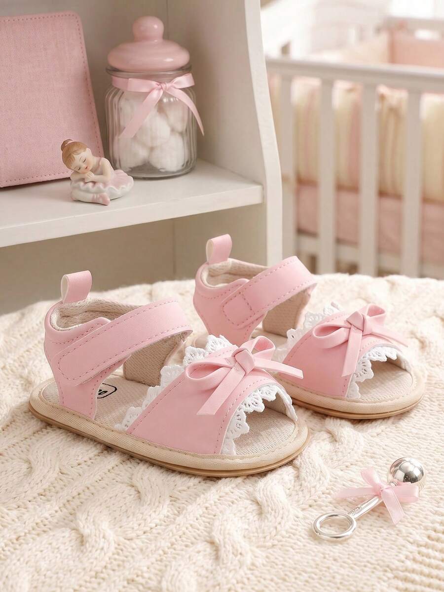 1 Pair Girls Bowknot PU Hook And Loop Design Flat Non-Slip Princess Shoes Soft Rubber Sole Walking Shoes Hollow Breathable Infant Sandals Suitable For Spring And Summer - Pink - View 1