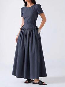 2026 Nuevo vestido casual de mujer minimalista de primavera/verano con cuello redondo, mangas cortas abullonadas, cintura con lazo lateral y rayas, vestido de verano para mujer - Azul marino - Ver 1